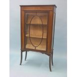 An Edwardian inlaid mahogany display cabinet, frieze painted with floral drapes,single astragal-