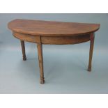 A George III half-round mahogany side table, on tapering legs with blind-fret detail, 4ft. 3in.