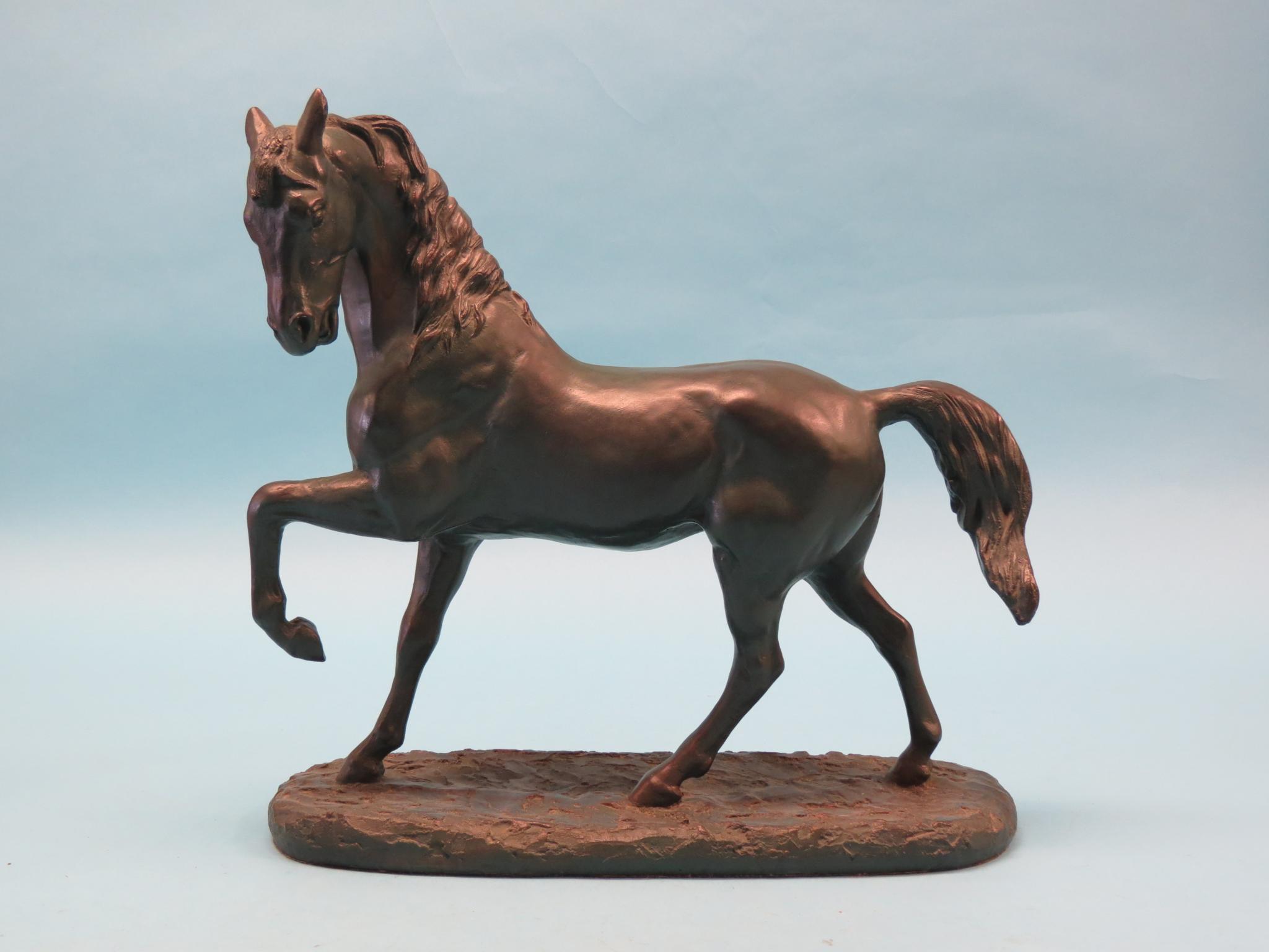 A modern simulated bronze model of a horse, 15.5in. high