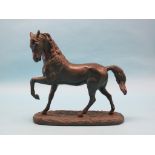 A modern simulated bronze model of a horse, 15.5in. high