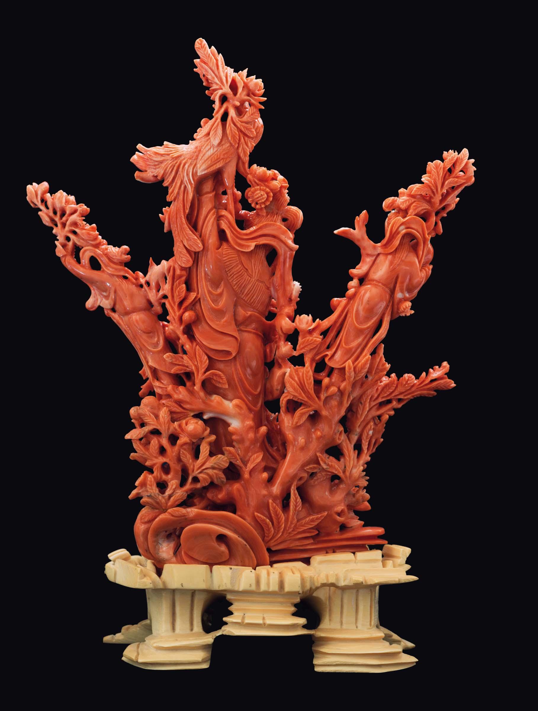 A finely carved coral group of three Guanyin between roses with carved ivory base, China, early 20th - Image 3 of 3