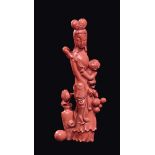 A carved coral "Guanyin with children and balls", China, Qing Dynasty, late 19th century gr. 699,