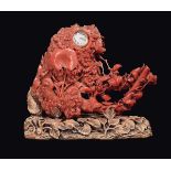 A coral group whit wooden base with a set watch, China, early 20th century gr. 795 lordi, h cm 15