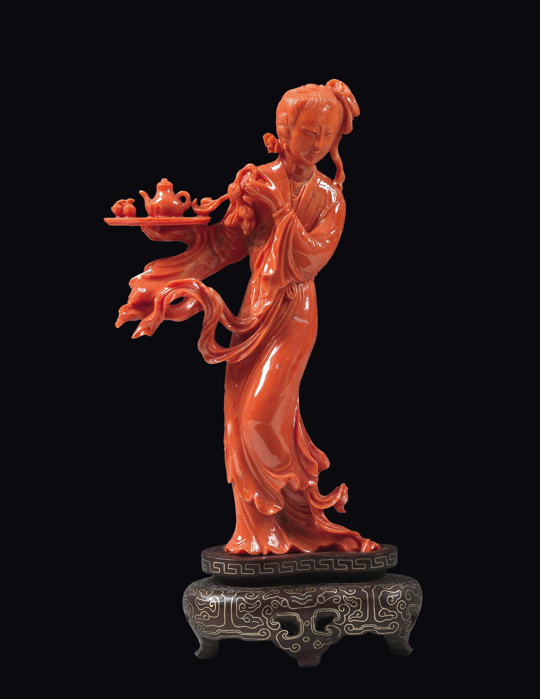 A carved coral "Guanyin with tray", China, early 20th century gr. 137, h cm 14 Starting Price: €