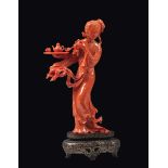 A carved coral "Guanyin with tray", China, early 20th century gr. 137, h cm 14 Starting Price: €