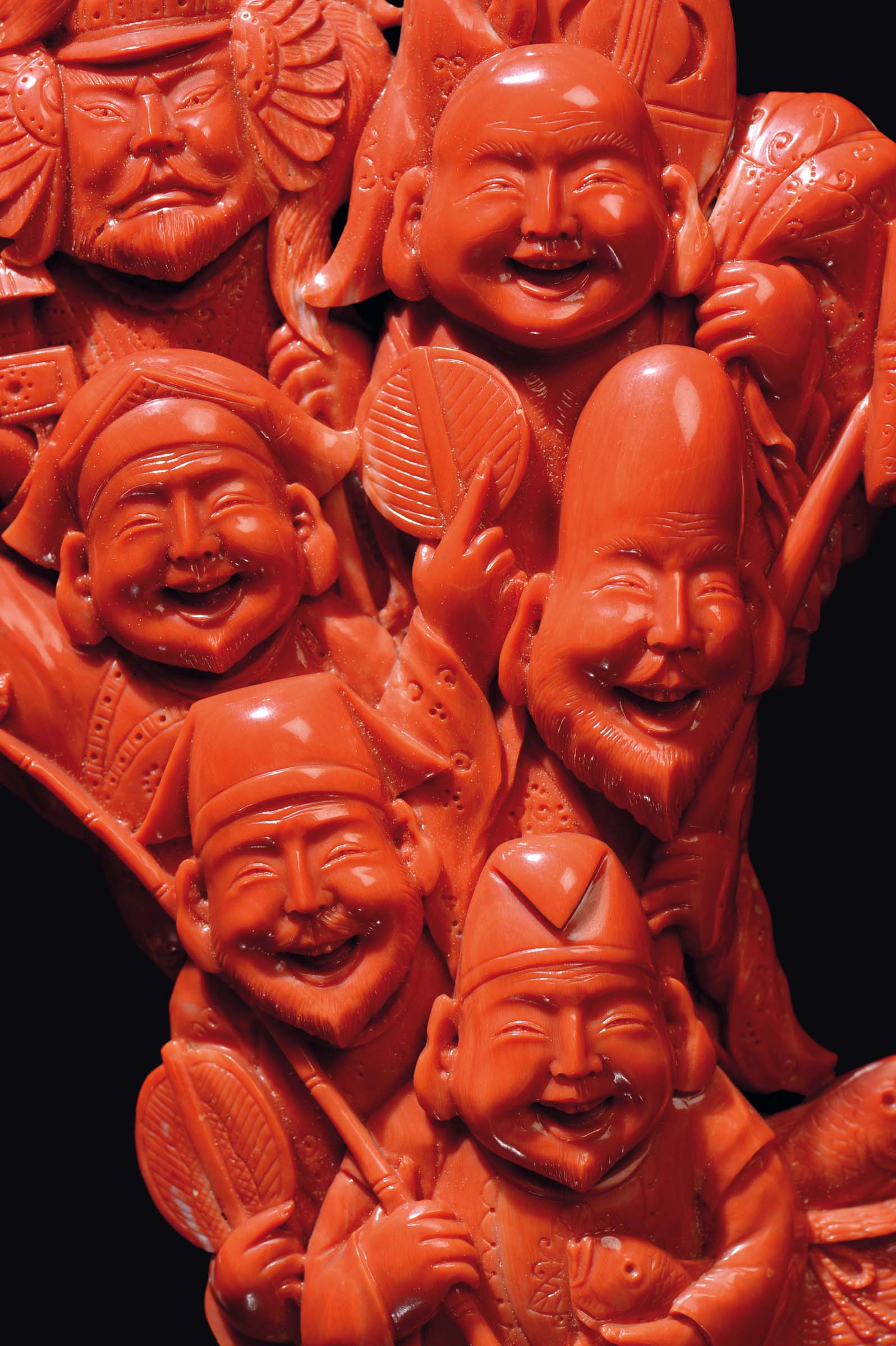 A carved coral group of dignitaries and fishermen with a basket full of fish, China, early 20th - Image 3 of 3