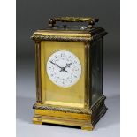 A late 19th/early 20th Century French carriage clock, No. 5317, the 2.25ins diameter white enamelled