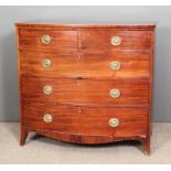 A late George III mahogany bow-front chest of drawers, the top with square edge inlaid with