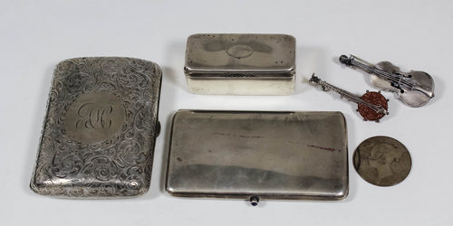 A German silvery metal rectangular card case of plain design, the circular clasp set with a cabochon
