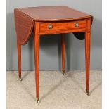 A George III satinwood oval Pembroke table, the top crossbanded in rosewood and with stringings,