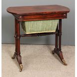 A George IV rosewood rectangular work table with bowed ends, fitted single drawer and pull-out cloth