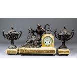 A late 19th Century French pink veined marble and spelter mounted clock garniture, comprising -