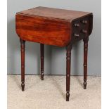 A George III mahogany dropleaf work table with twin moulded top edge and D-shaped flaps, fitted