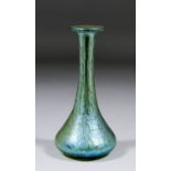 An early 20th Century glass vase of flared form with iridescent decoration, possibly Loetz, with