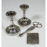 A pair of 18th Century English silver sugar nips with scallop pattern blades, 4.75ins high, possibly