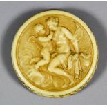 A late 18th/early 19th Century Continental ivory circular box and cover carved with Venus and