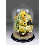 A late Victorian coloured wax and glass composition still life of fruit and leaves, 10.5ins high,