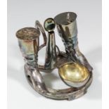 A plated cruet/condiment set of "Riding Apparel" design, 4.25ins x 5ins high, by Elkington & Co (No.