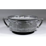 An early 20th Century Liberty Tudric pewter two-handled rose bowl designed by David Veasey, cast