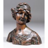 Gustave Van Varenbergh (1873-1927) - Brown patinated bronze bust of a young woman with her hair tied