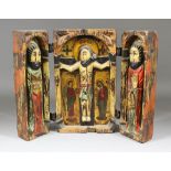 A 20th Century Spanish wood triptych, deeply carved, painted and gilded with central image of the