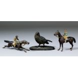 An Austrian cold painted bronze figure of a finch, 2.25ins high, and two cold painted bronze figures