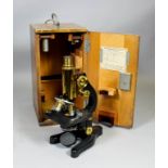 A microscope by Ernest Leitz, No. 276328, with three objective lenses, contained in fitted