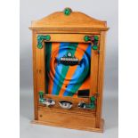 A 1950s Bryan's oak cased penny-in-the-slot "Five-Win" Alwin game, with orange, green and blue