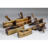 A quantity of 19th Century wooden moulding planes and other woodworking tools, and a selection of