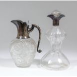 A George V silver topped and diamond and slice cut-glass claret jug, 8.5ins high, by John Grinsell &