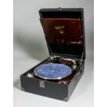 A 1920s Orchorsol portable gramophone with Garrard No. 11a motor, in blue leather cloth covered case