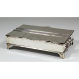 A late Victorian plain silver rectangular two-handled enclosed inkstand of early 18th Century