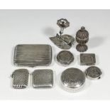 A late Victorian silver vesta case of reeded form, 2ins x 1.5ins, Birmingham 1892, an Edward VII