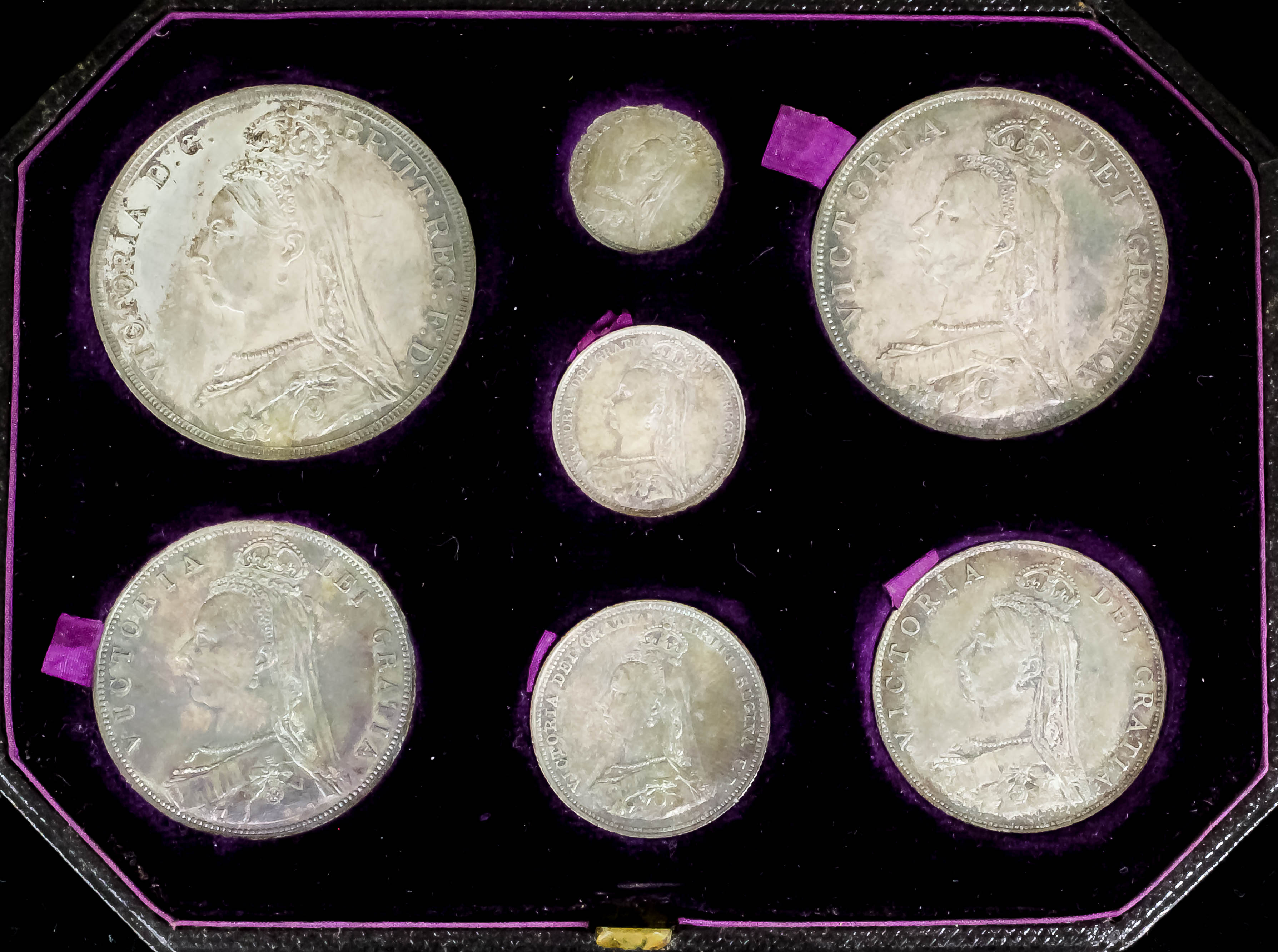 A set of seven Victoria 1887 Golden Jubilee silver specimen set coins - Crown to threepence (