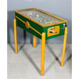 A 1950s electrically powered penny-in-the-slot "Soccer" Pin Ball table, the pitch with ten