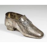 A late Victorian silver novelty snuff box modelled as a gentleman's 18th Century shoe with ruffled