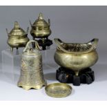 A Chinese bronze two-handled censer engraved with three clawed dragons chasing the Sacred Pearl, 6.