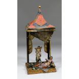 An early 20th Century painted spelter electric table lamp modelled in the form of two Eastern ladies