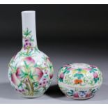 A Chinese porcelain bottle shaped vase enamelled in colours with peaches and blossoms, 6.75ins (
