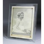 Attributed to Dorothy Wilding (1893-1976) - Photograph - Seated portrait of a young girl thought