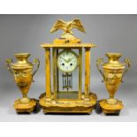 A late 19th/early 20th Century French Sienna marble and gilt metal mounted three piece clock