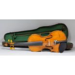 An early 20th Century German full size violin with figured two piece back (back measurement