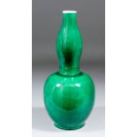 A Chinese green glazed porcelain double gourd shaped vase, 10.25ins (261mm) high (19`th Century)