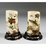 A pair of Japanese ivory tusk section vases decorated in gilt lacquer with flowering trees, frogs