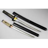 A Japanese Wakizashi, the 12.5ins highly polished blade, unsigned, with  iron Tsuba and cotton bound