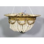 A 20th Century gilt metal circular three sconce ceiling light of 19th Century French design, cast