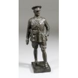 Early 20th Century bronze figure of a First World War officer holding a revolver, 9ins high (tip