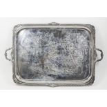 A George V silver rectangular two-handled tray with bold gadroon, shell and leaf scroll mounts to