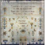 A Victorian sampler worked by Martha R. Couchman, 1860,  in coloured silks with a four line verse