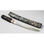 A Japanese Tanto, the 10.5ins polished Koto blade, signed "Kanenobu", with cotton bound shagreen